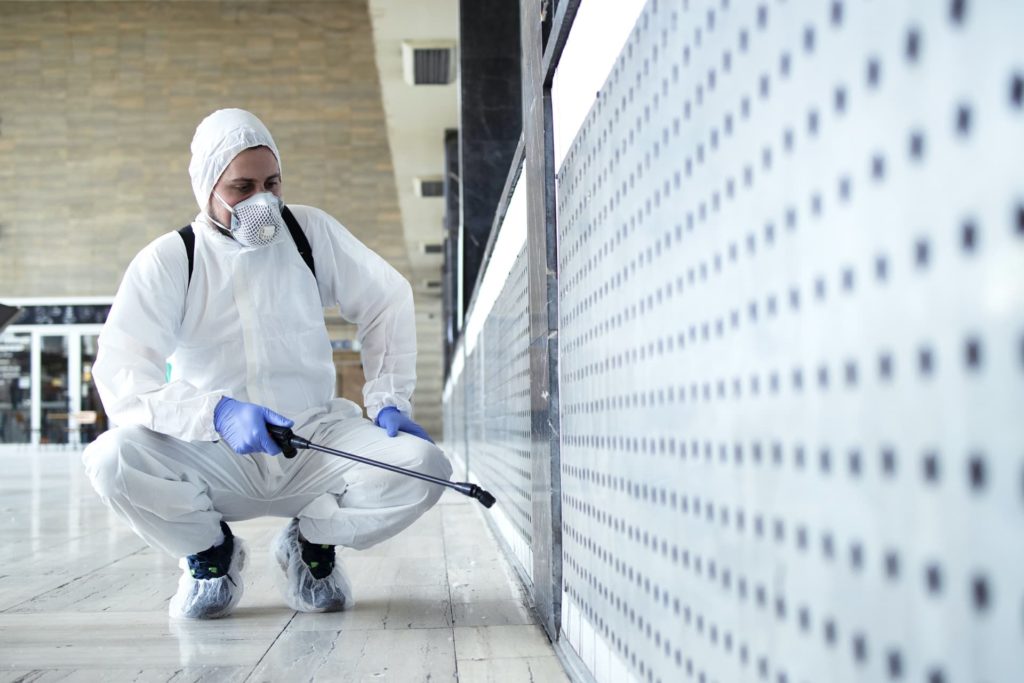 Man Doing Covid Disinfection - Covid-19 Cleaning Services